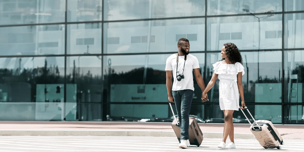Couple with luggage at the airport